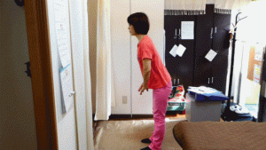 25腰痛整体施術後の前屈後屈